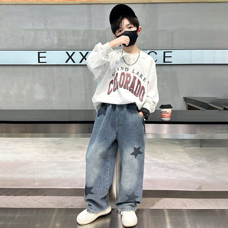 Unisex wide jeans pants with star appliqués Mune Fashion