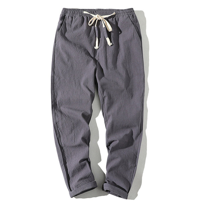 Men's lightweight linen trousers with elastic waistband and drawstring, tapered fit and roll-up hem Mune Fashion