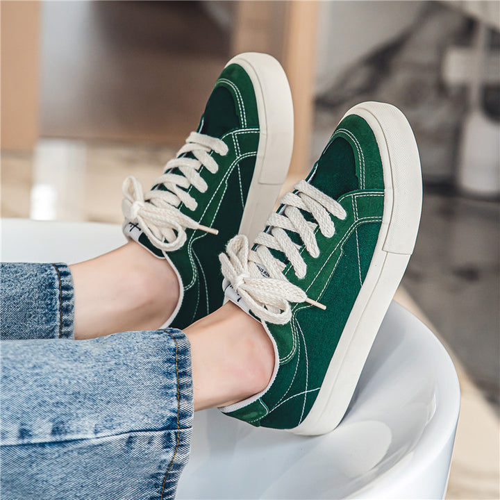 Unisex casual canvas low-top sneaker with contrasting decorative stitching and padded platform sole Mune Fashion
