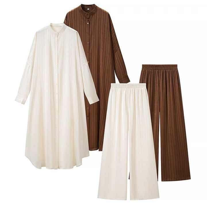 Women’s maxi dress in pleated kaftan style with oversized sleeves and button placket Mune Fashion