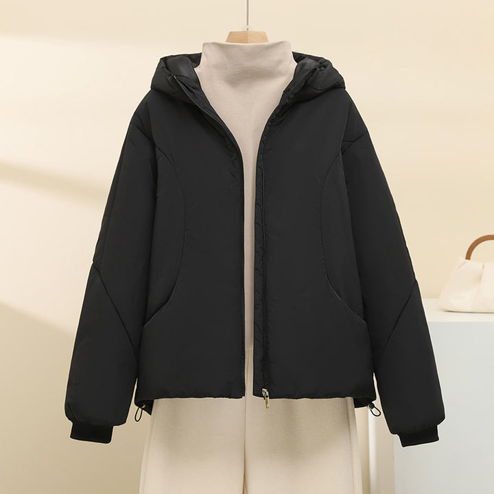 Women's quilted hooded jacket with short boxy cut, adjustable hem, and warming padding Mune Fashion