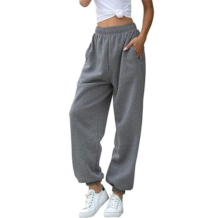 Women's wide High-Waist jogging pants made of soft fleece with elastic waistband, side pockets, and narrow cuffs Mune Fashion