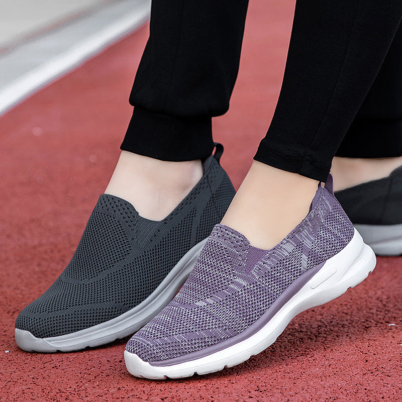 Women's slip-on knit trainer with sock-like shaft, pull tab, and responsive cushioning Mune Fashion