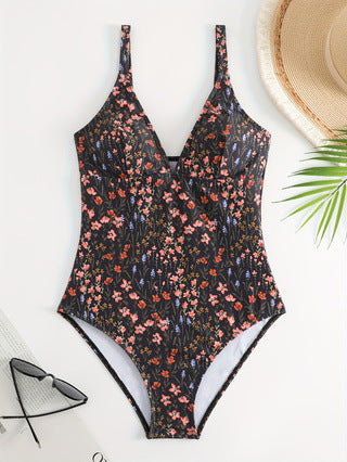 Ladies elegant and body-hugging swimsuit with floral design Mune Fashion