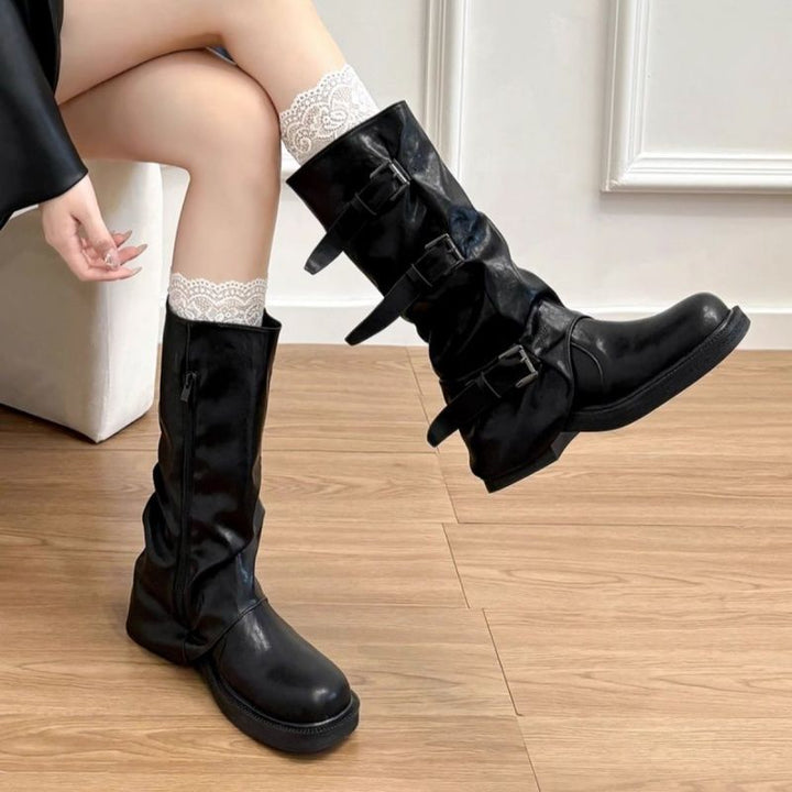 Women's knee-high slouch boots made of synthetic leather with adjustable buckles and textured platform heel Mune Fashion