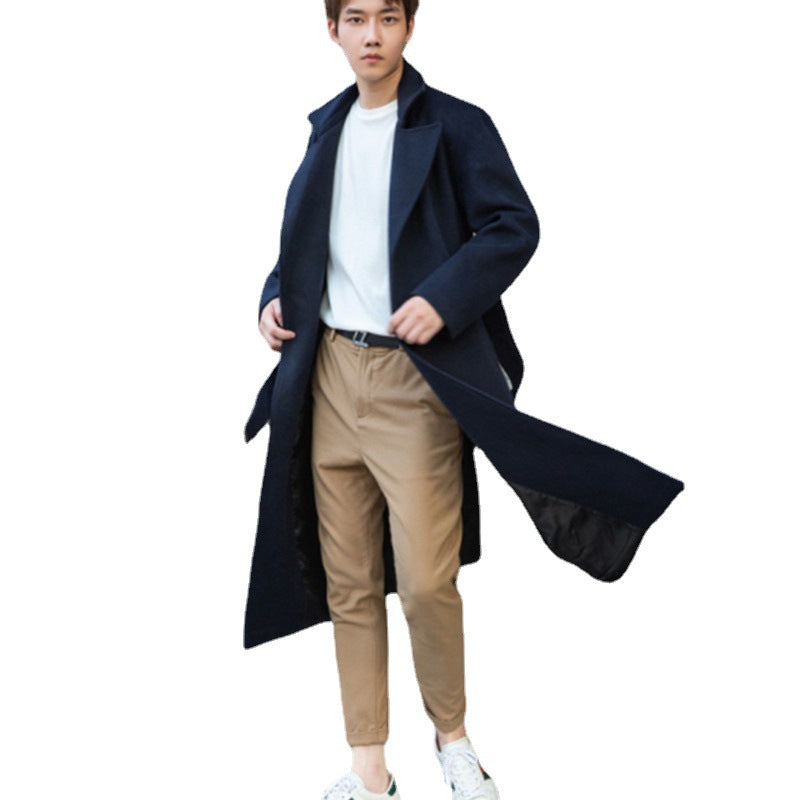 Men's long cut wool coat in minimalist design with generous shawl collar and concealed button placket Mune Fashion