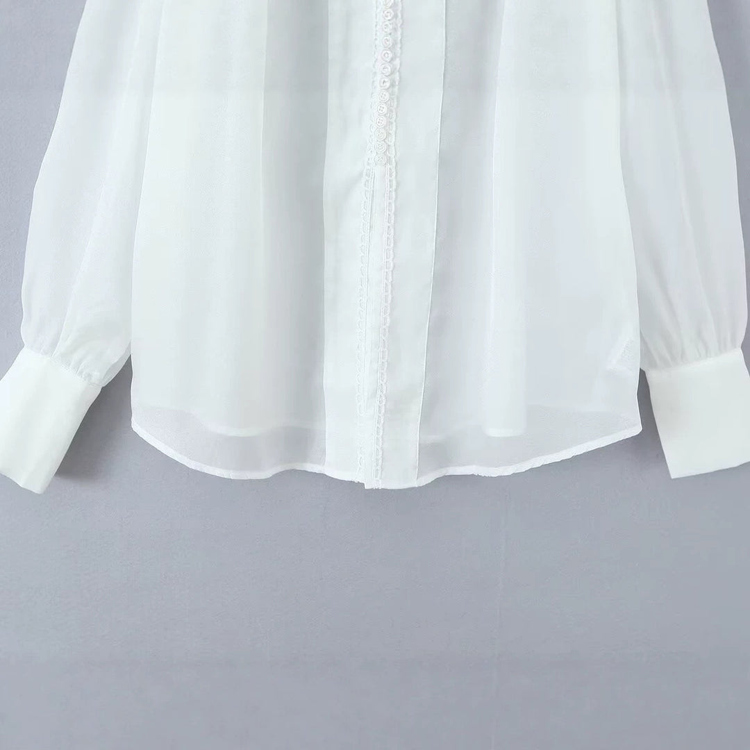 Ladies transparent chiffon blouse with volume sleeves, lace trim and wide cuffs