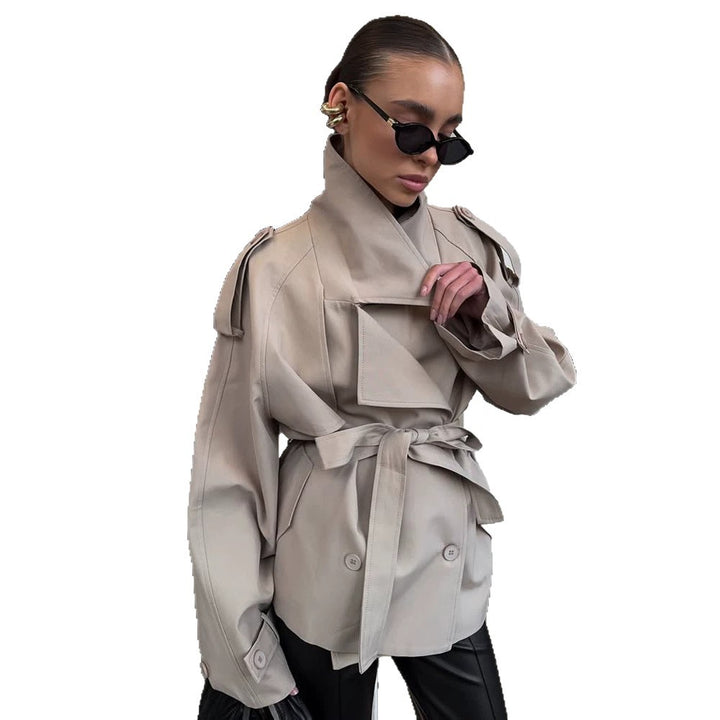 Women's short trench coat with wide standing collar, shoulder epaulettes, and waist belt Mune Fashion