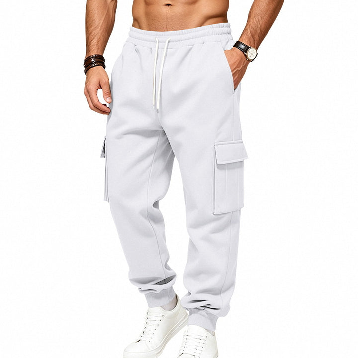 Men's cargo joggers made of sweat fabric with drawstring, elastic cuffs, and large flap pockets Mune Fashion