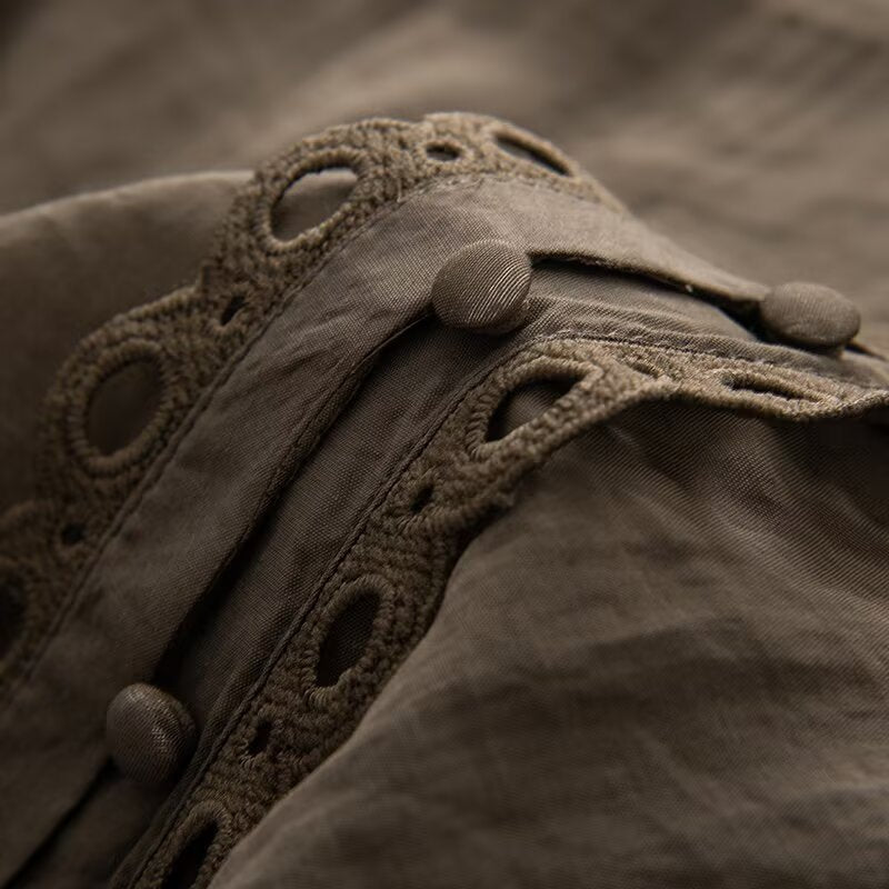 Ladies blouse with lace cutouts, fine button placket and balloon sleeves Mune Fashion