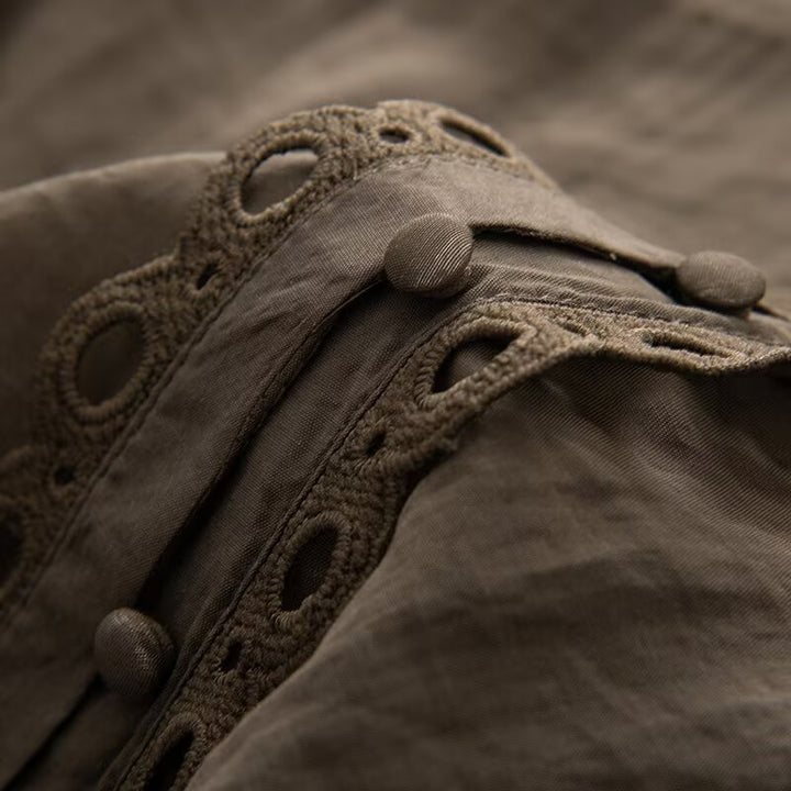 Ladies blouse with lace cutouts, fine button placket and balloon sleeves Mune Fashion