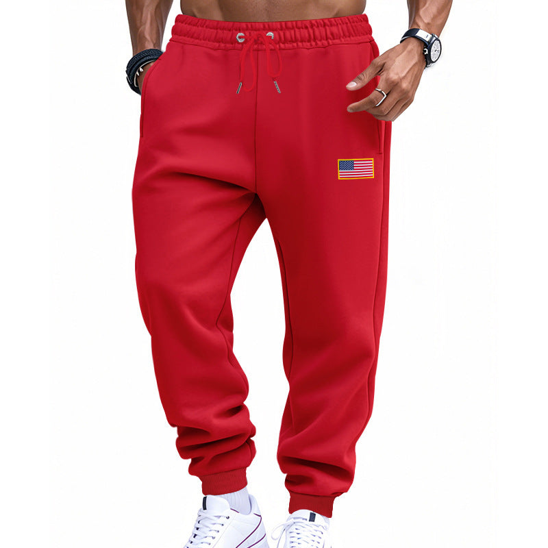 Men's trendy joggers with elastic drawstring waistband, ribbed cuffs, and discreet flag application Mune Fashion