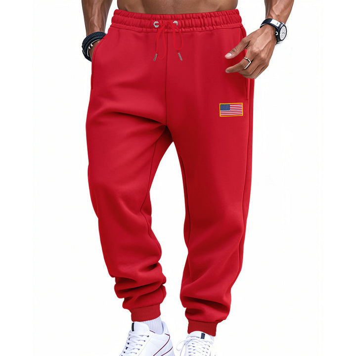 Men's trendy joggers with elastic drawstring waistband, ribbed cuffs, and discreet flag application Mune Fashion