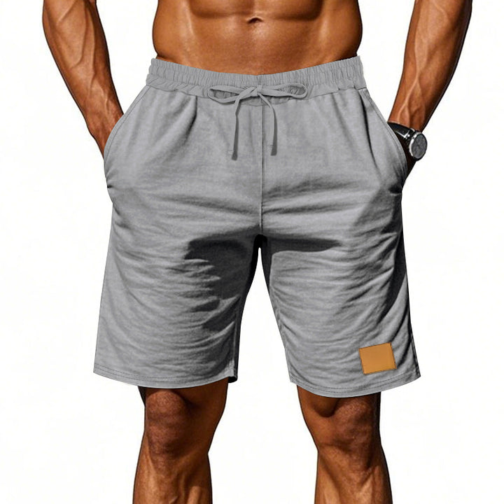 Men's drawstring Bermuda shorts made of soft cotton blend with elastic waistband and side pockets Mune Fashion