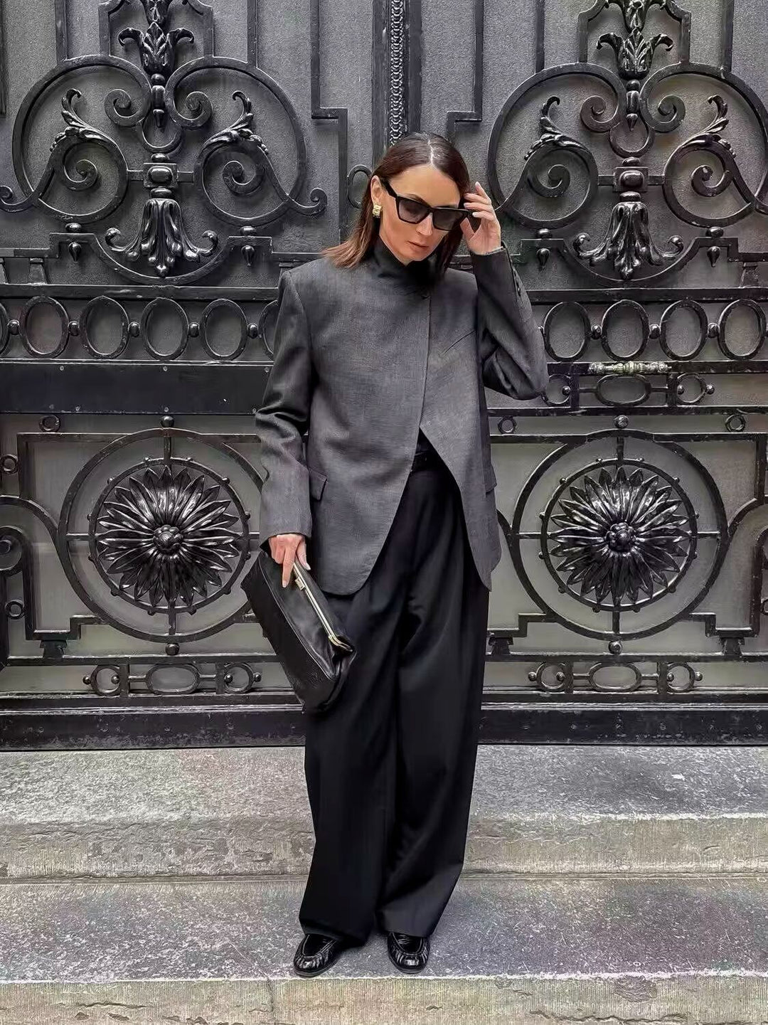 Women's oversized blazer in boxy cut with asymmetrical stand collar and concealed button placket Mune Fashion