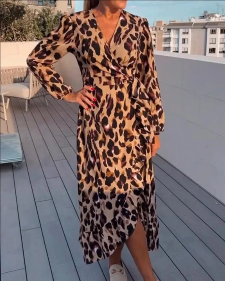 Women’s wrap midi dress with waist tie, V-neck, balloon sleeves and asymmetrical hem Mune Fashion