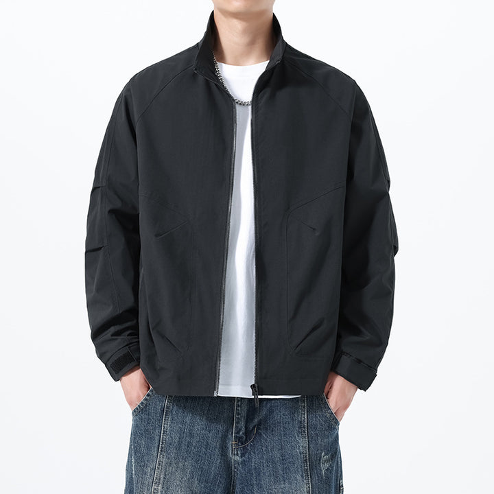 Men's Lightweight Utility Transitional Jacket with Stand Collar, Raglan Sleeves, and Adjustable Velcro Cuffs Mune Fashion