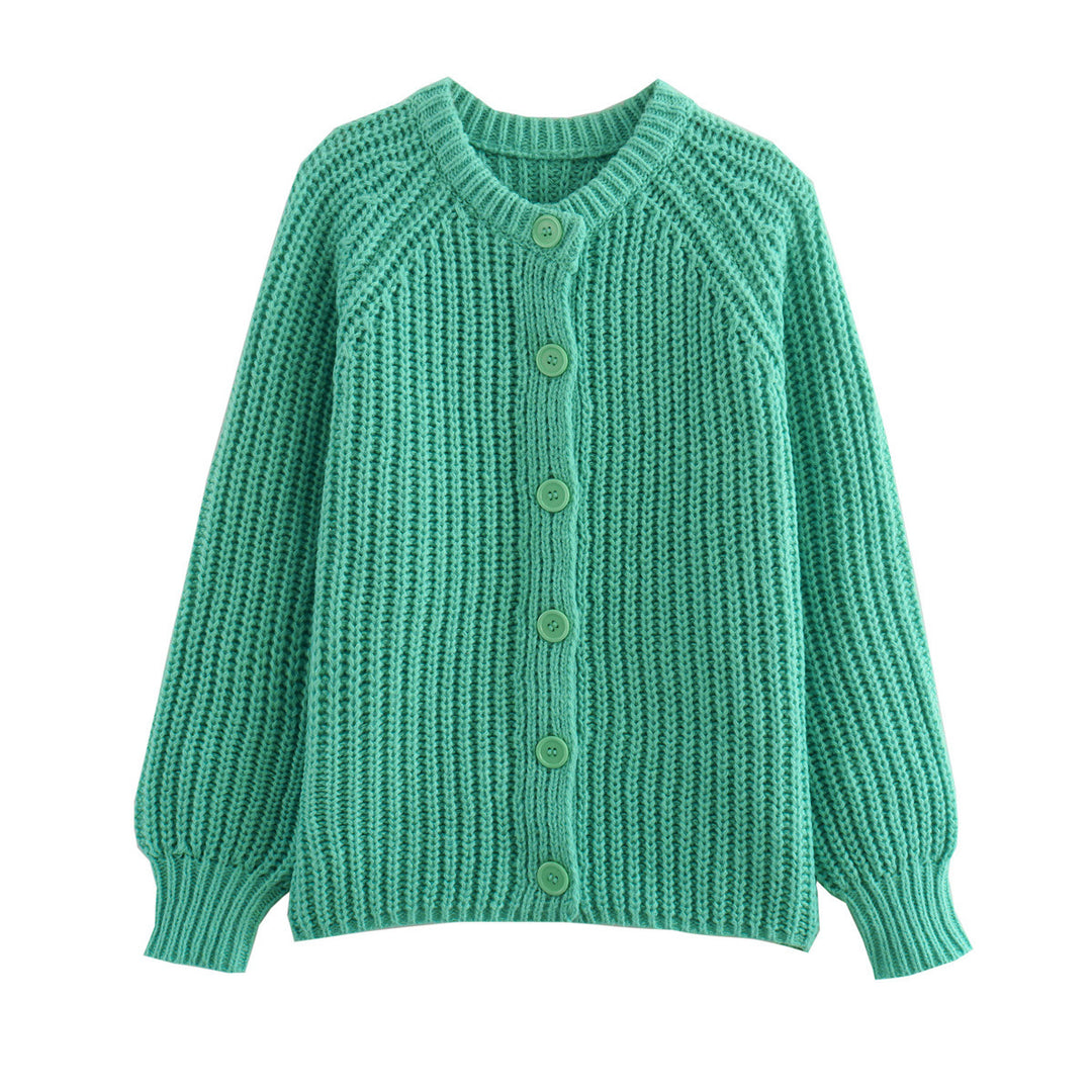 Women's chunky knit raglan cardigan with full button placket, wide cuffs, and relaxed silhouette Mune Fashion