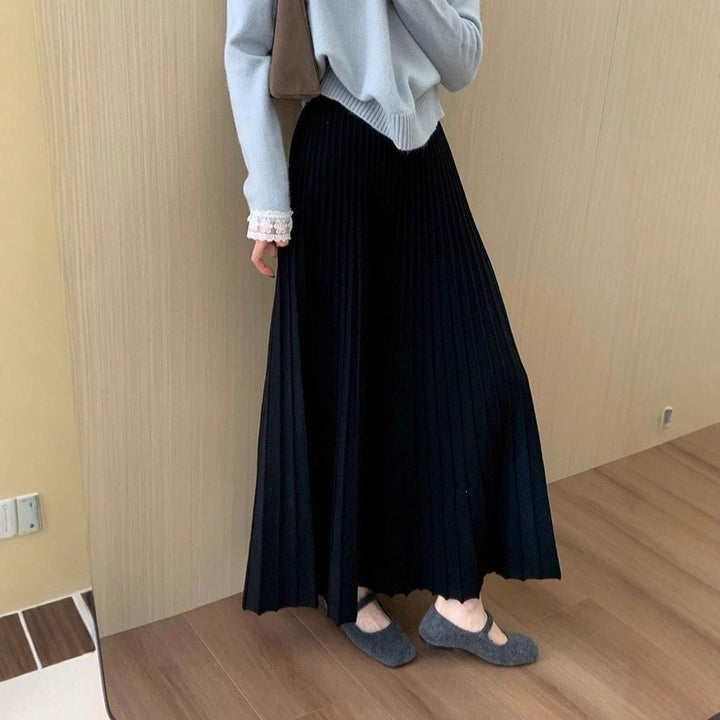 Women's Flowing Midi Skirt with Elegant Pleats Mune Fashion