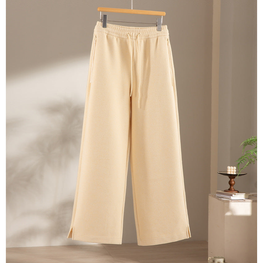 Women's wide French-Terry lounge sweatpants with high waistband, drawstring and side slits Mune Fashion