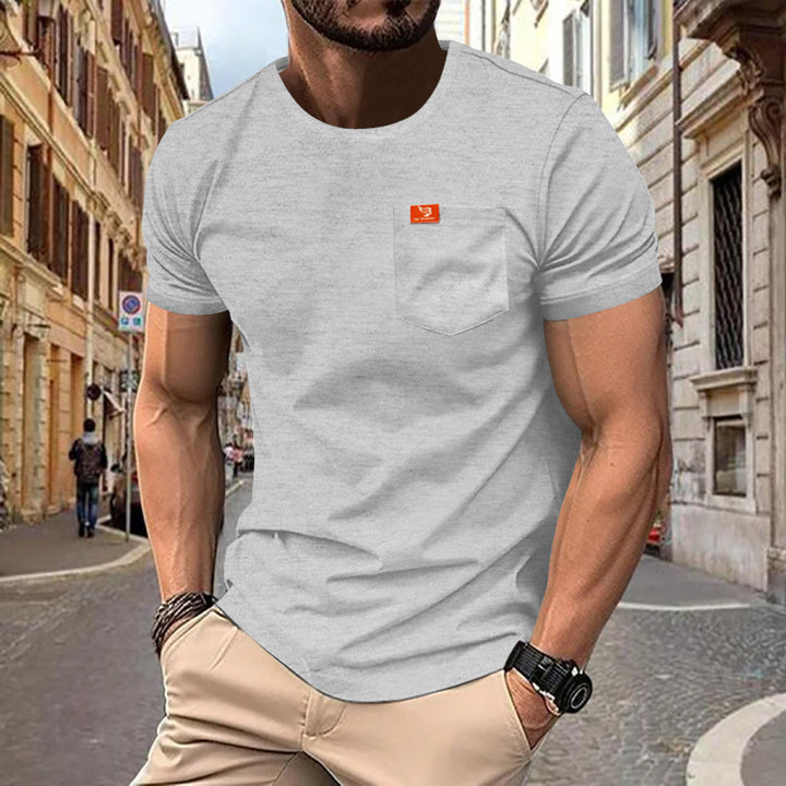 Men's single jersey short-sleeve shirt with patch chest pocket, reinforced seams, and round neckline Mune Fashion