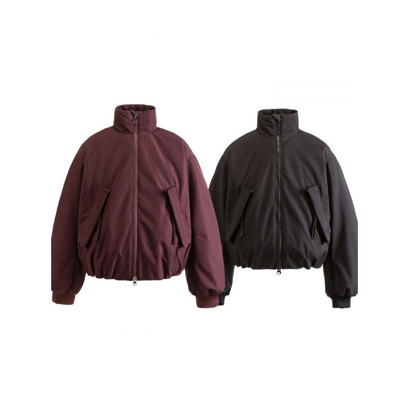 Unisex Boxy quilted bomber jacket with high stand-up collar and flap pockets Mune Fashion