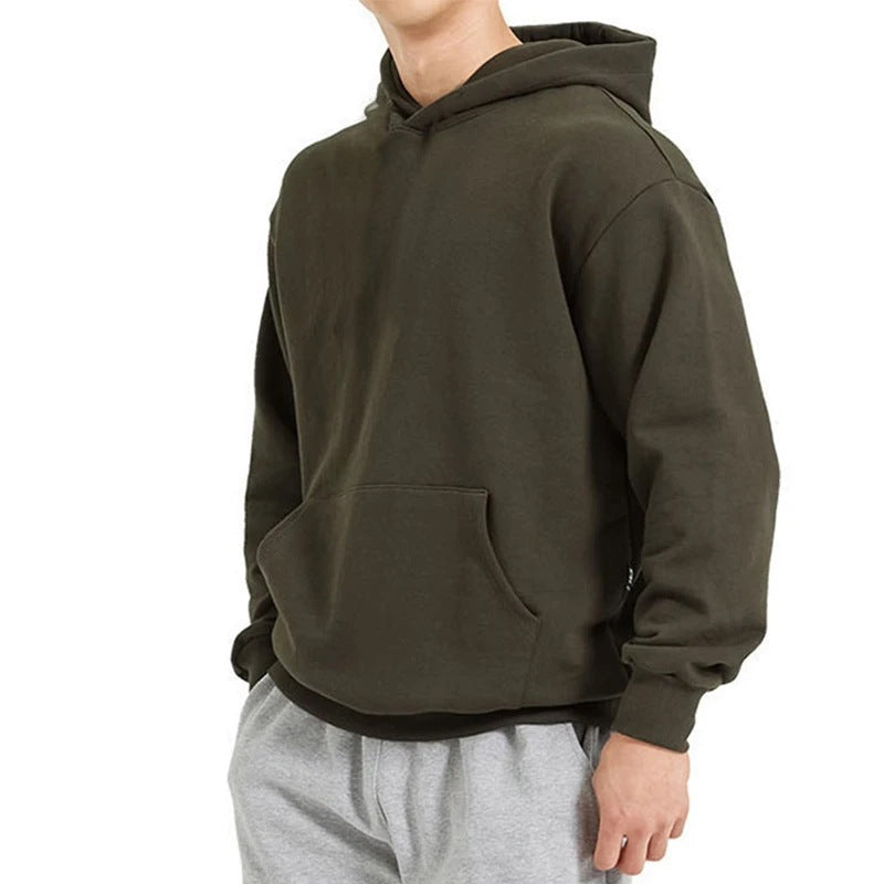 Men's heavy hooded sweatshirt in boxy cut with kangaroo pocket, ribbed hem, and soft brushed interior Mune Fashion