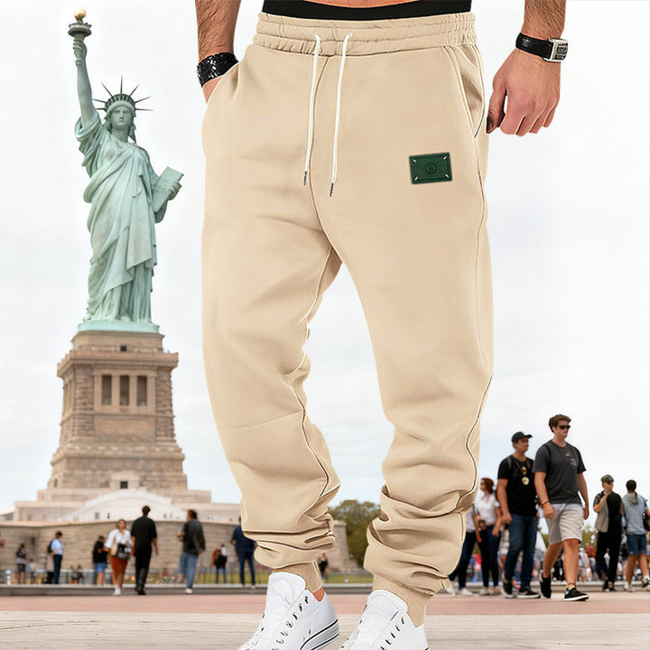 Men's Slim-Fit Sweat Jogger with elastic waistband, drawstring, and ribbed cuffs