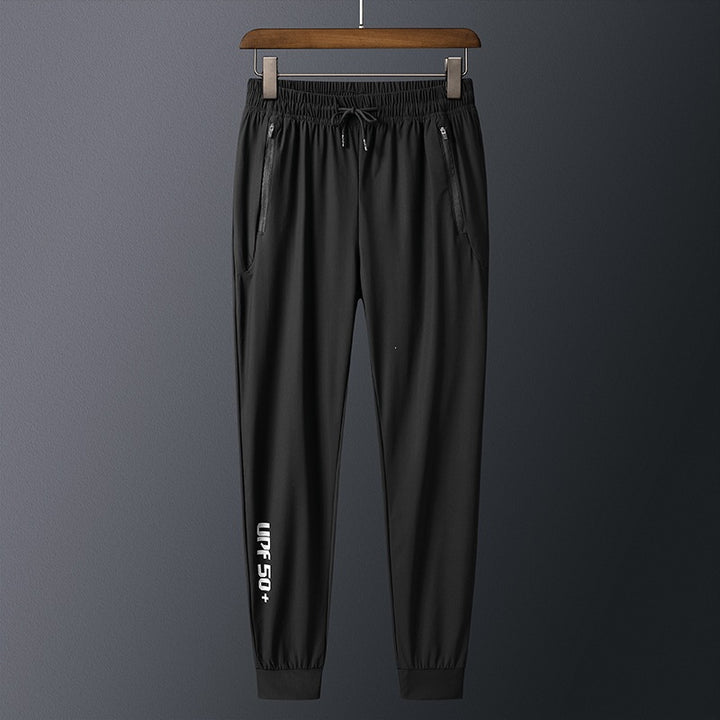 Men's sporty training pants with practical zip pockets Mune Fashion
