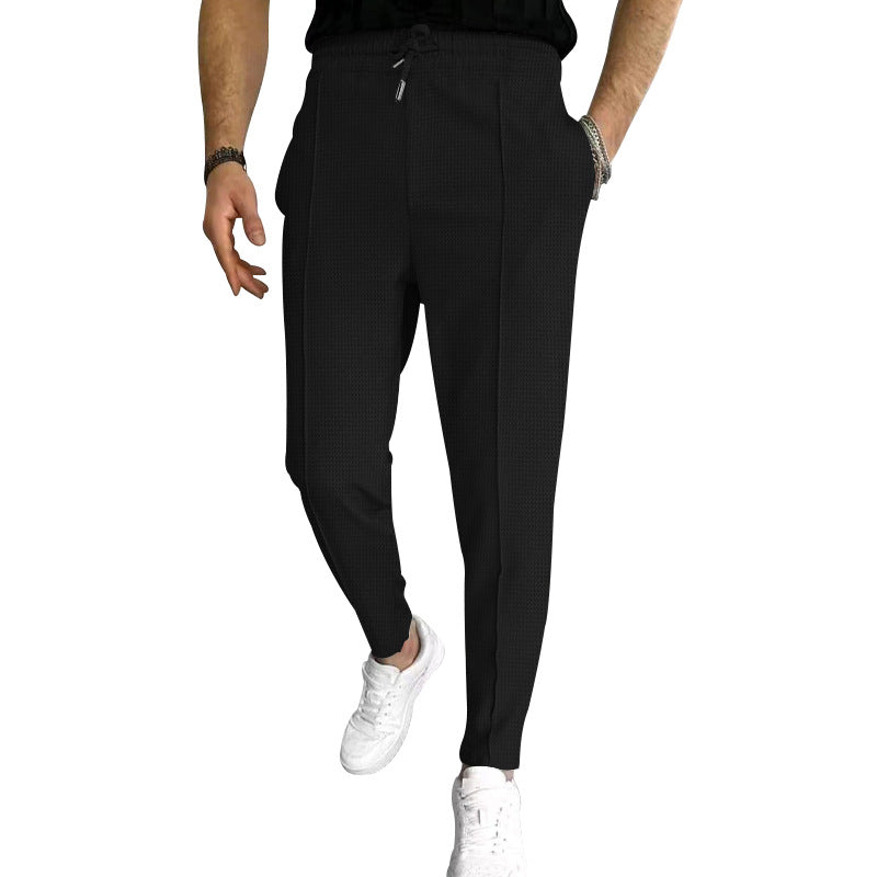 Men's tapered jogging chinos made of structured woven quality with elastic drawstring waistband and decorative crease Mune Fashion