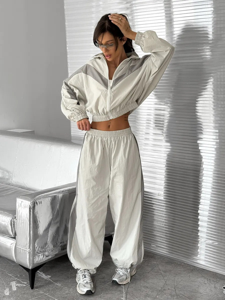 Women's satin track set with stand-up collar, chevron stripes and drawstring Mune Fashion