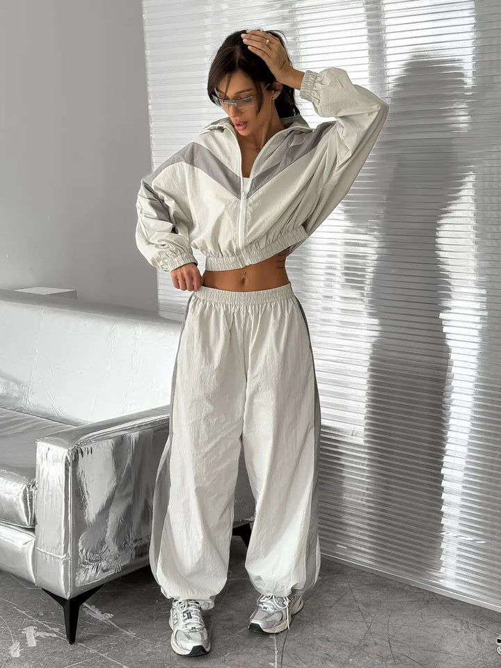 Women's satin track set with stand-up collar, chevron stripes and drawstring Mune Fashion