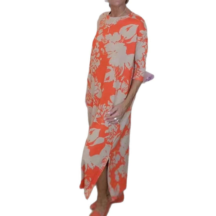 Women’s flowing A-line maxi dress with three-quarter sleeves round neckline side slit and inserted pockets Mune Fashion