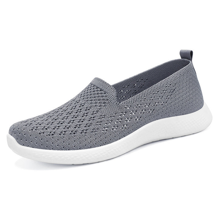 Women’s seamless knit slip-on with perforated air mesh structure, ergonomic memory footbed, and lightweight EVA cushioning Mune Fashion