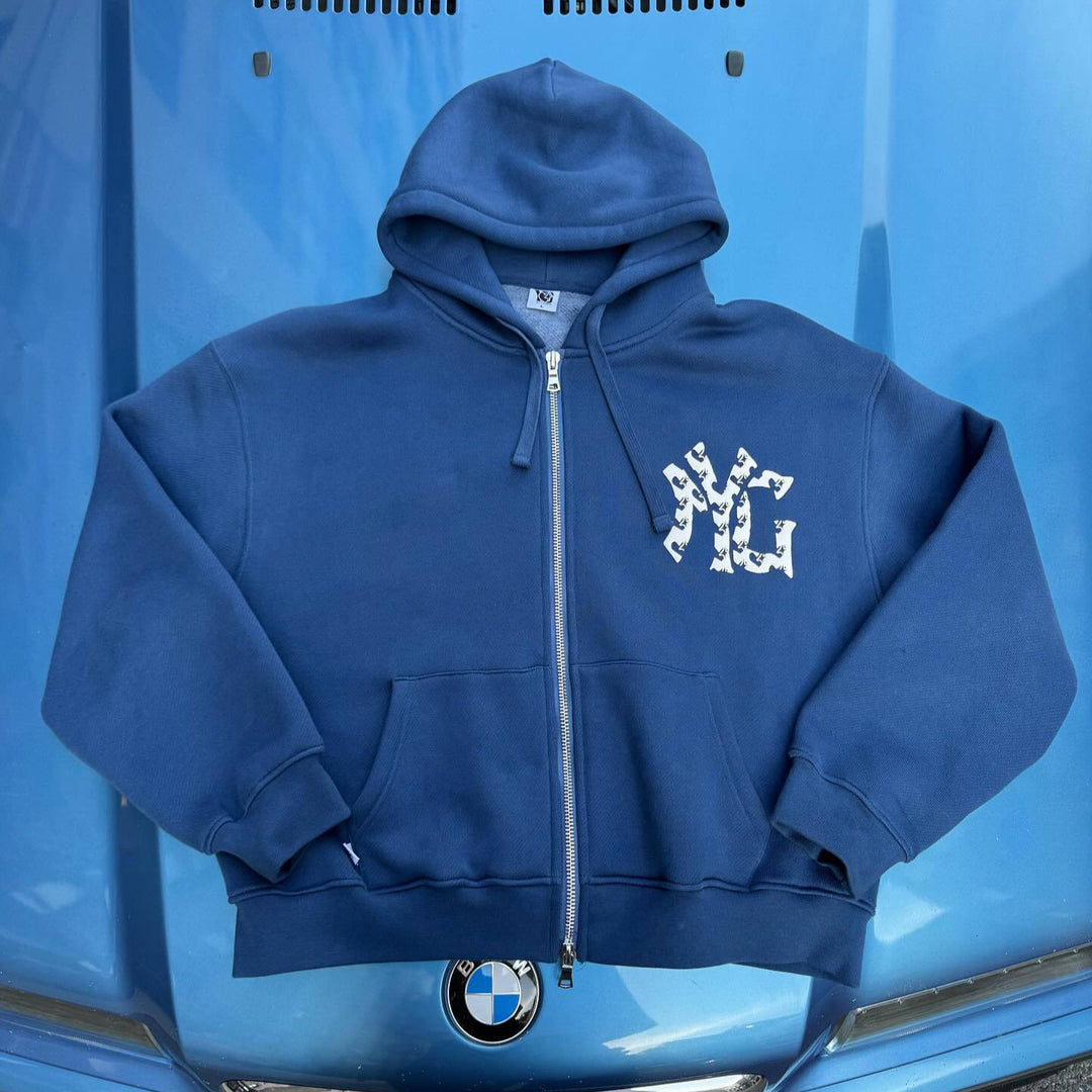 Unisex oversized hooded sweatshirt jacket with two-way zipper and logo application Mune Fashion
