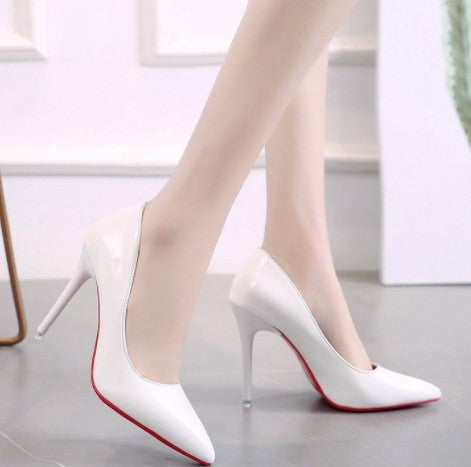 Women's high-gloss pointed toe patent pumps with narrow stiletto heel and contrast sole Mune Fashion