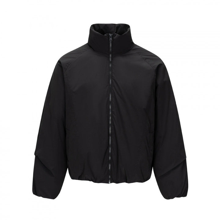 Unisex Short cut lightweight windbreaker in boxy cut with high stand-up collar and elastic hem Mune Fashion