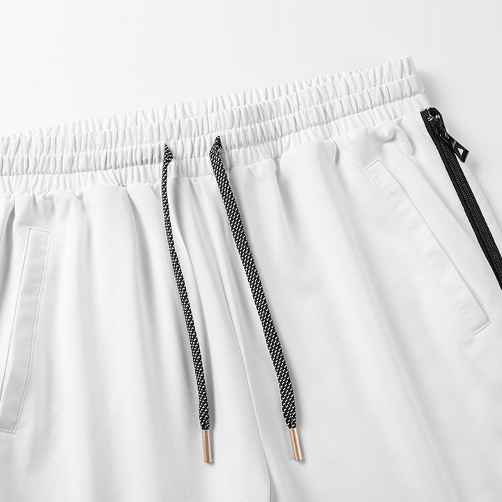 Men's loose-fitting street style jogging pants with bandana side insert and elastic hem Mune Fashion
