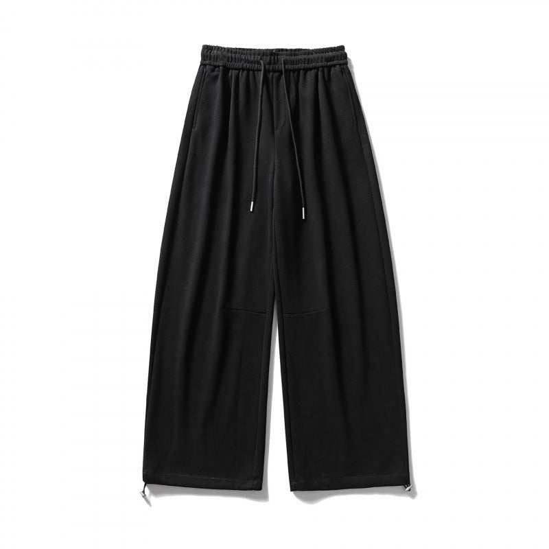 Unisex Wide Sweatpants with drawstring waistband, cord drawstring, and adjustable leg straps Mune Fashion