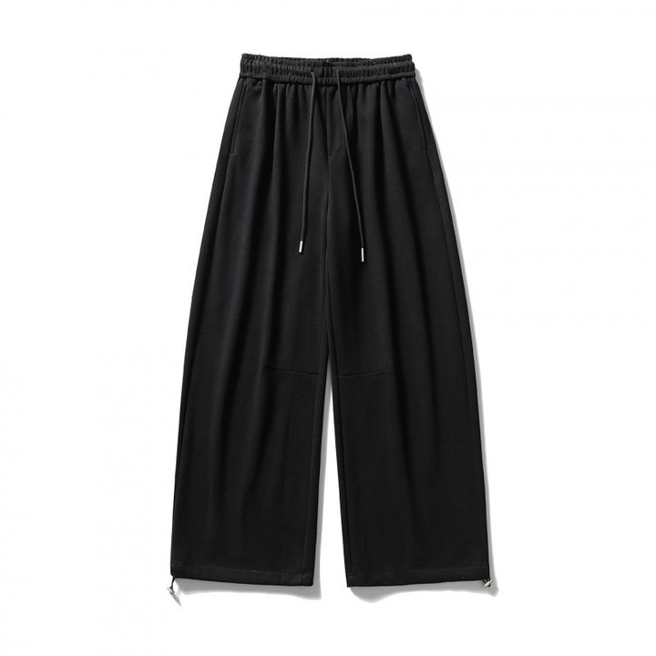 Unisex Wide Sweatpants with drawstring waistband, cord drawstring, and adjustable leg straps Mune Fashion