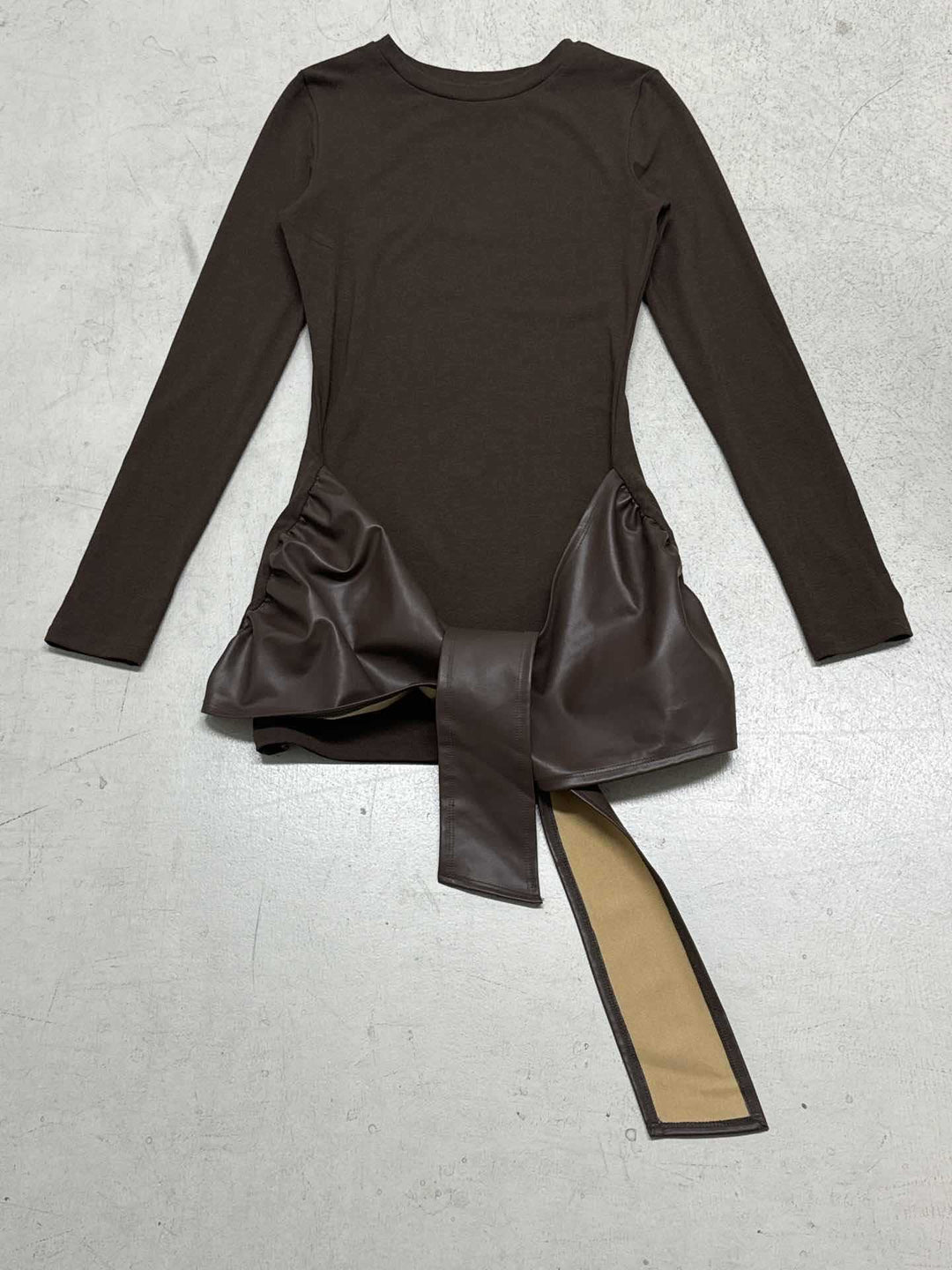 Women's tailored long sleeve mini dress with faux leather wrap waistband and draped detail Mune Fashion