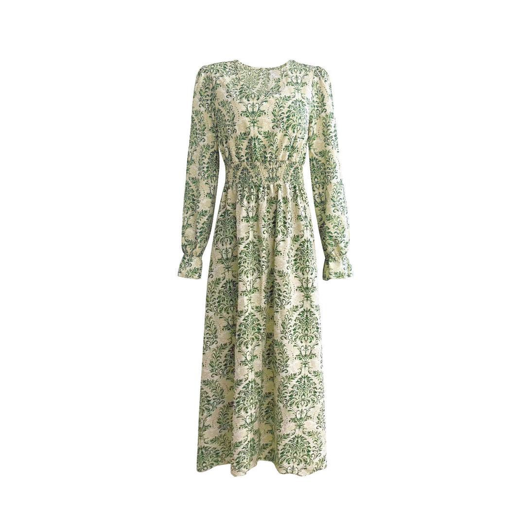 Ladies' feminine flowing maxi dress with V-neck, gathered smock waist area and ornamental all-over print