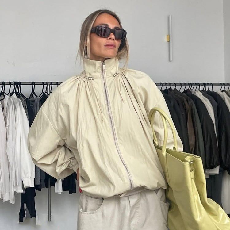 Women's Oversize Windbreaker with high stand-up collar, drawstring shoulder yoke, and balloon sleeves Mune Fashion
