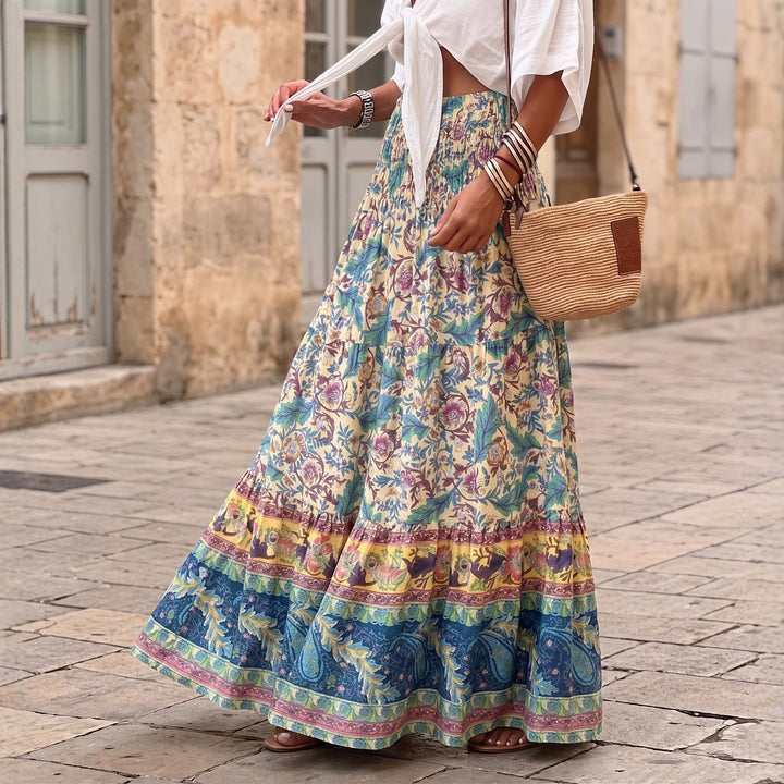 Women's layered maxi skirt with floral print, elastic smocked waistband and ruffle edges Mune Fashion