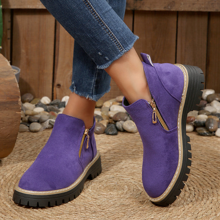 Women's ankle-high boot with decorative zipper, padded shaft, and sturdy profile sole Mune Fashion