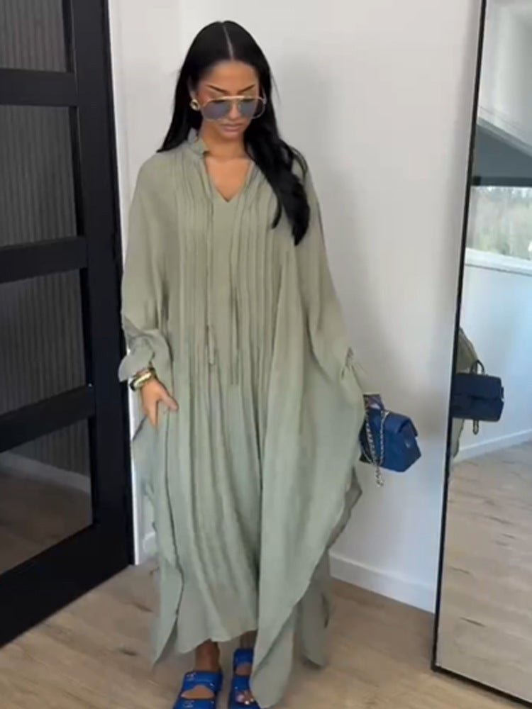Women's maxi dress in kaftan style with ruffled collar, tie straps, and voluminous sleeves Mune Fashion