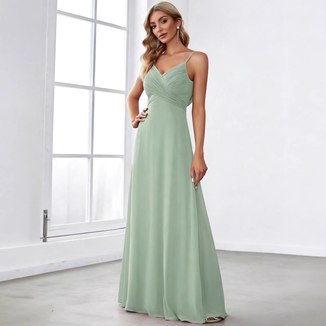 Ladies flowing chiffon evening dress with crossed draping, empire waist and fine spaghetti straps Mune Fashion