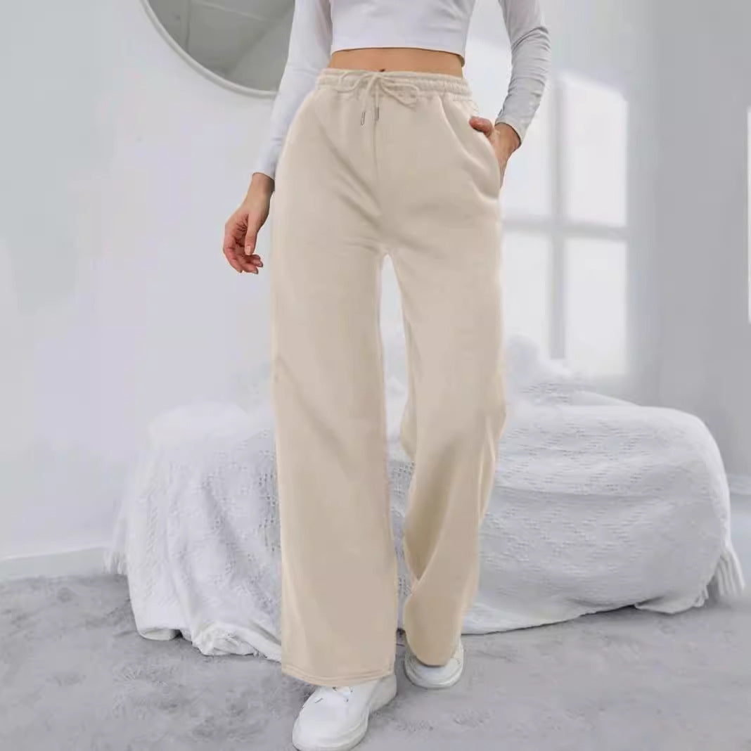 Women's High-Waist Wide-Leg Jogging Pants with elastic comfort waistband, drawstring, and deep side pockets Mune Fashion