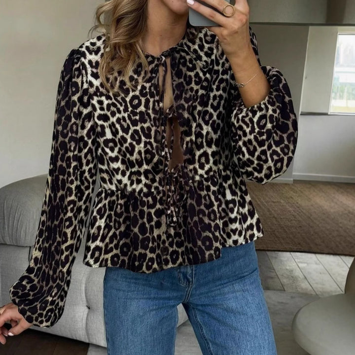 Women’s blouse with leopard print, tie bands and balloon sleeves Mune Fashion
