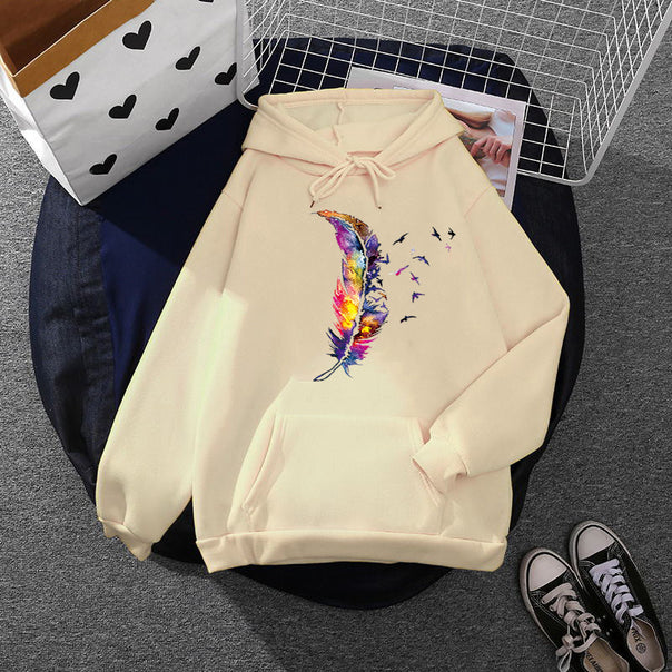Women’s hoodie with artistic watercolor feather design, oversized cut and kangaroo pocket Mune Fashion